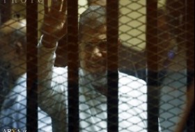 محاکمه مرسی در قفس