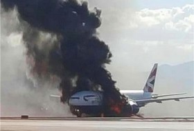 آتش گرفتن هواپیما با 159 مسافر+عکس