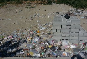 فقدان سطل زباله برای جمعیت هزار نفری/ لزوم ساماندهی محل تلاقی کمربندی آیت الله سیستانی با جاده کرباسک